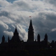 Clouds form a backdrop for the buildings on Parliament Hill in Ottawa on Tuesday, Oct. 22, 2013. MPs return to Parliament on Monday with the spectre of the Senate expenses scandal still hovering over the Harper government. THE CANADIAN PRESS/Sean Kilpatrick
