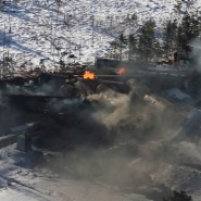 Derailed train cars continue to burn in Plaster Rock, N.B., Jan.8, 2014. THE CANADIAN PRESS/Tom Bateman 