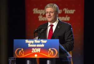 Canadian Prime Minister Stephen Harper addresses guests at the Confederation of Greater Toronto Chinese Business Association's Annual Lunar New Year Gala in Toronto on Saturday February 8, 2014. THE CANADIAN PRESS/Chris Young 