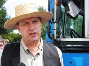 Farmer Michael Schmidt talks to reporters on Thursday July 31, 2021 outside court in Newmarket, Ont. Schmidt and his supporters are taking their self-professed right to drink unpasteurized milk, which the government calls a "significant public health risk," to Ontario's top court.THE CANADIAN PRESS/Colin Perkel 