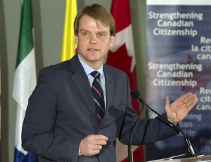 Canada's Citizenship and Immigration Minister Chris Alexander speaks after unveiling changes to Canada's Citizenship Act in Toronto on Thursday February 6, 2014. THE CANADIAN PRESS/ Frank Gunn 