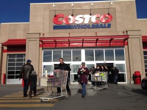 Customers walk out of Costco in Montreal on Saturday, Nov. 17, 2012. A judge has ruled that major retailers do not have to modify their commercial names to French to continue operating in Quebec. A Quebec Superior Court justice says businesses that have storefront signs with their trademark name in a language other than French do not contravene the French Language Charter. THE CANADIAN PRESS/Ryan Remiorz 