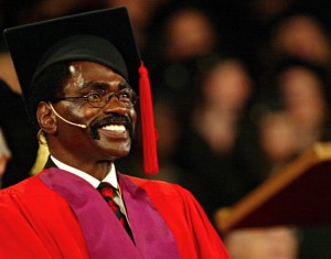 Rubin "Hurricane" Carter smiles as he waits to receive an honorary degree at York University on Oct. 14, 2005 in Toronto. Carter, the former American boxer imprisoned nearly 20 years for three murders before the convictions were overturned, has died at his home in Toronto. He was 76. THE CANADIAN PRESS/Nathan Denette