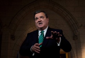 Finance Minister Jim Flaherty takes part in a TV interview on Parliament Hill in Ottawa on March 21, 2013. Former finance minister Jim Flaherty has died suddenly at age 64. THE CANADIAN PRESS/Adrian Wyld