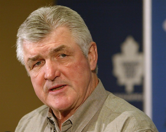 Toronto Maple Leafs head coach Pat Quinn answers questions following an optional skate in Toronto on Monday April 19, 2004. Legendary hockey coach Quinn has died at the age of 71, according to a spokeswoman at the Hockey Hall of Fame. HE CANADIAN PRESS/ /Frank Gunn)