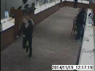 A suspect flees Peoples Jewelers in Devonshire Mall during a theft last Wednesday. Photo: Windsor Police