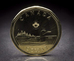 The Canadian dollar plunged below 72 cents US Thursday morning for the first time since May 2004, extending a series of 11-year lows set in recent weeks. THE CANADIAN PRESS/Jonathan Hayward 